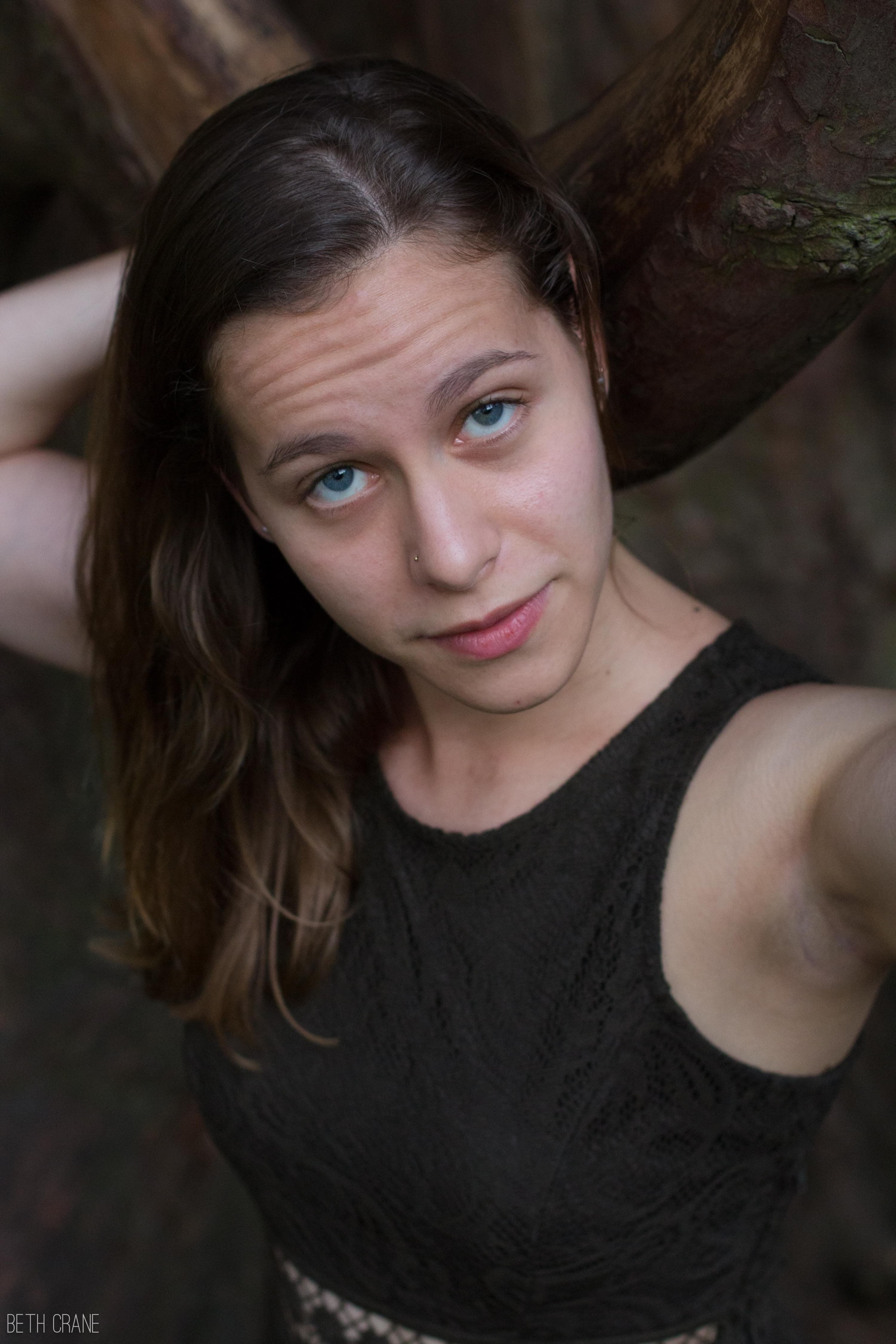 A photo of Hannah in a tree